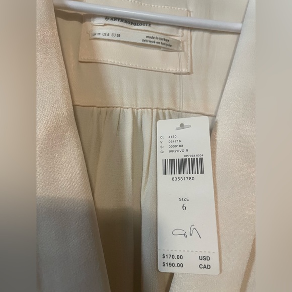 Ivory neck twist front satin dress from Anthropologie. Never worn. NWT. - Picture 2 of 3